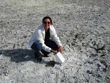Collecting a sample from the Great Salt Lake salt flats in Utah, USA. © Abigail Burt