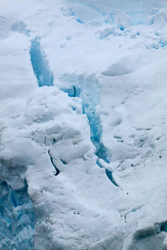 A crevasse in the glacier above Neko Harbour, Andvord Bay, Antarctic Peninsula, Antarctica. © David Burt