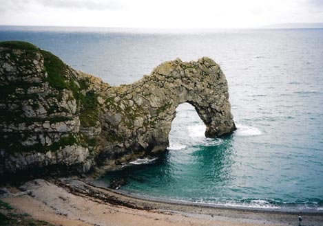 This sea arch has been eroded by waves.  Durdle Door, Dorset, England. © Abigail Burt